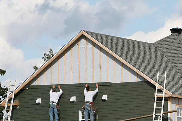 Professional Emergency Siding Repair technician working in Ferndale, PA